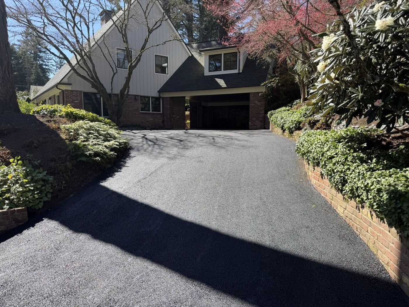 After: Beautiful fresh black sealed driveway