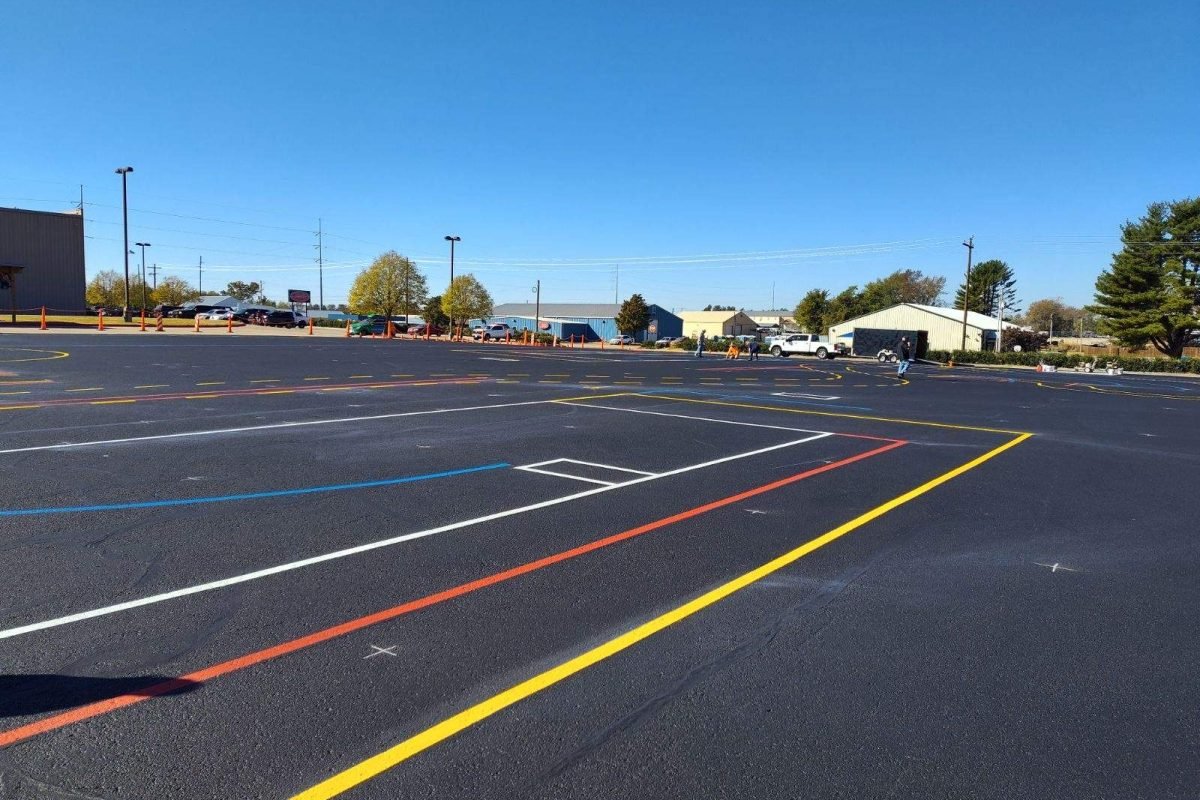 After: Freshly painted parking lot with colorful line markings